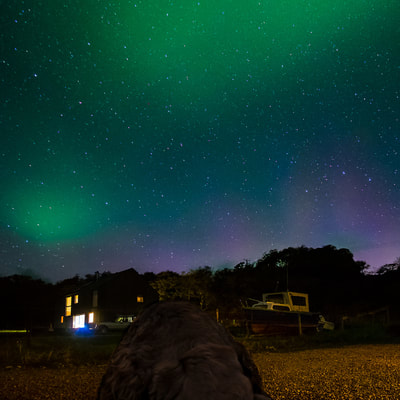 The Northern Lights in the sky above Rockpool House, Resipole, Sunart
